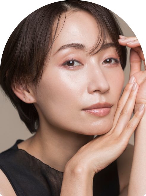 Woman with a luminous, poreless glass-skin complexion