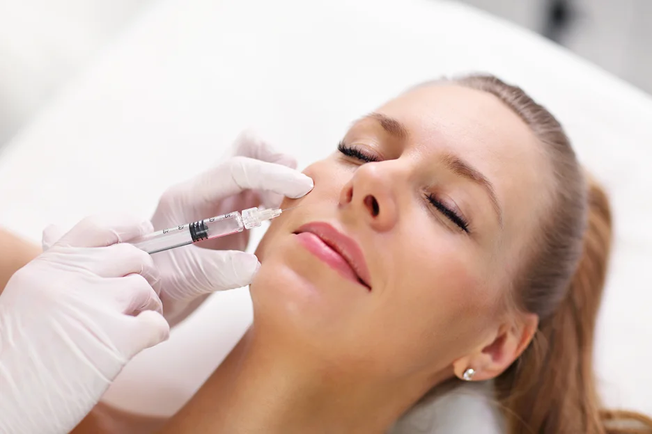 a woman underwent cheek filler treatment