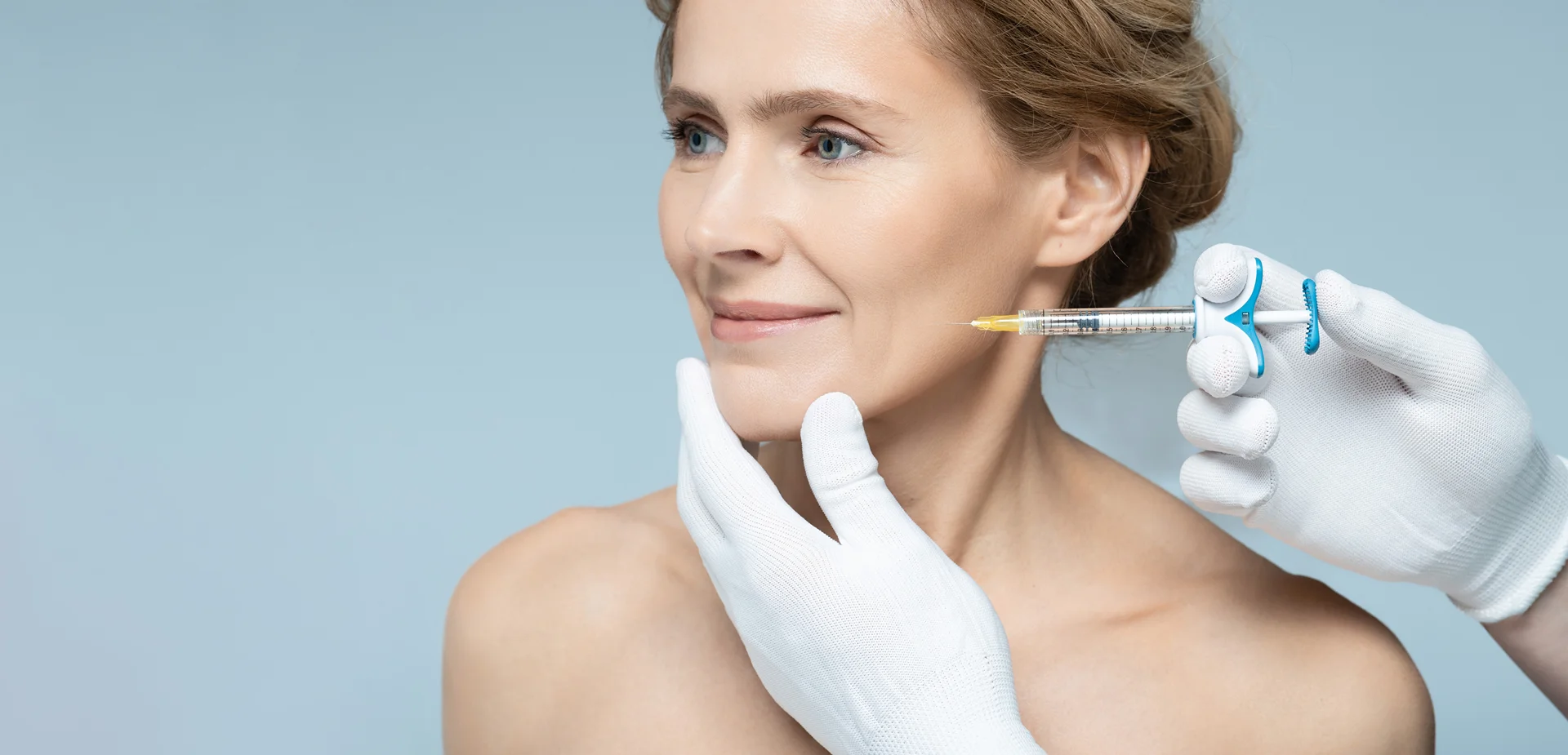 A Woman Getting Cheek Filler||