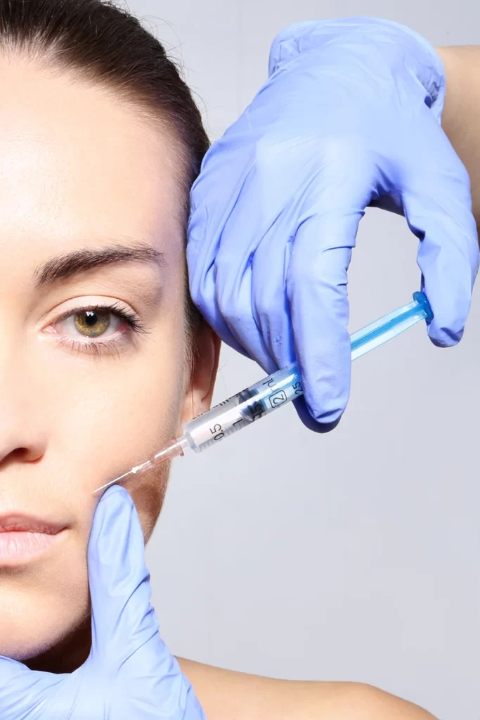 a woman getting cheek fillers