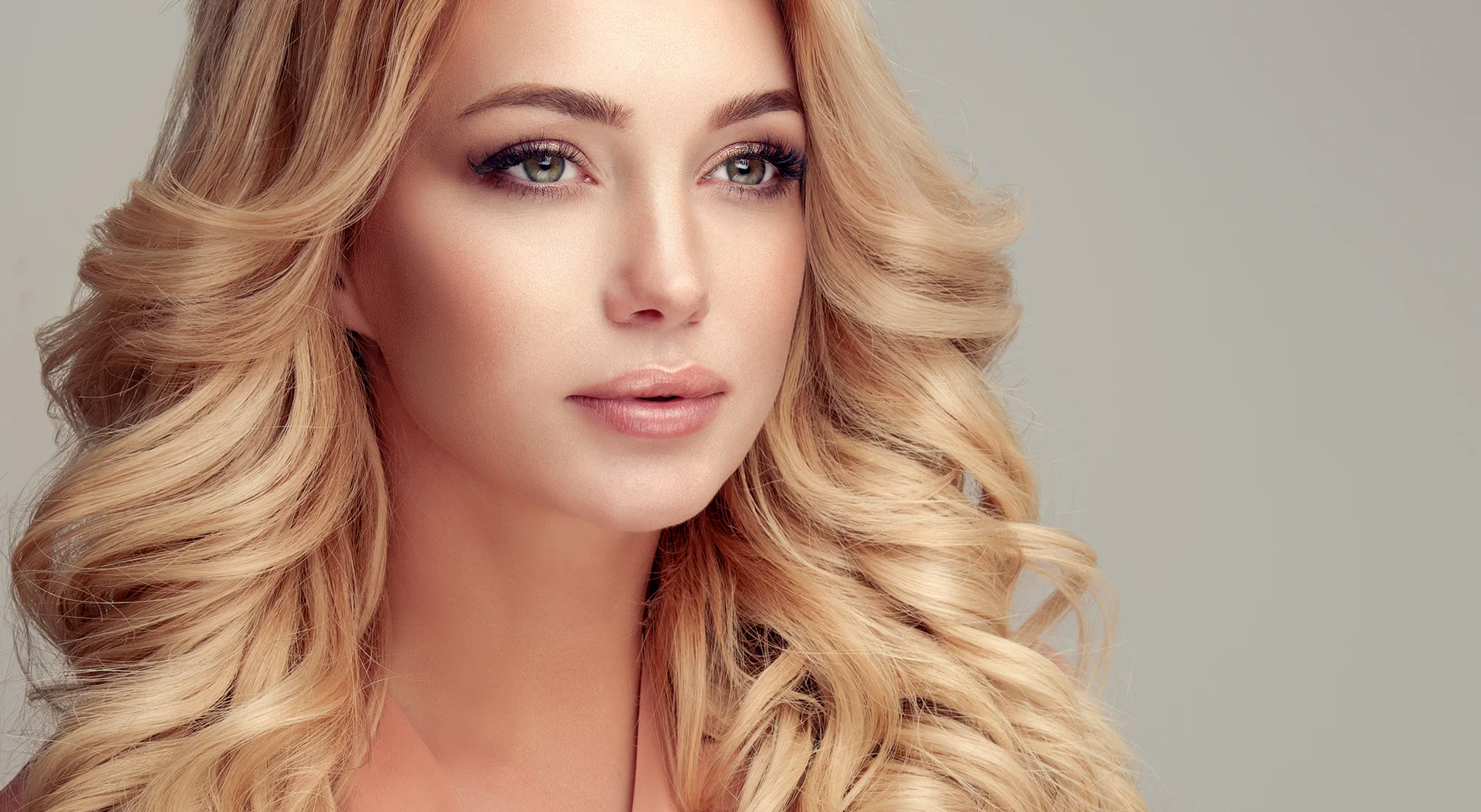 a portrait of a young blonde woman||