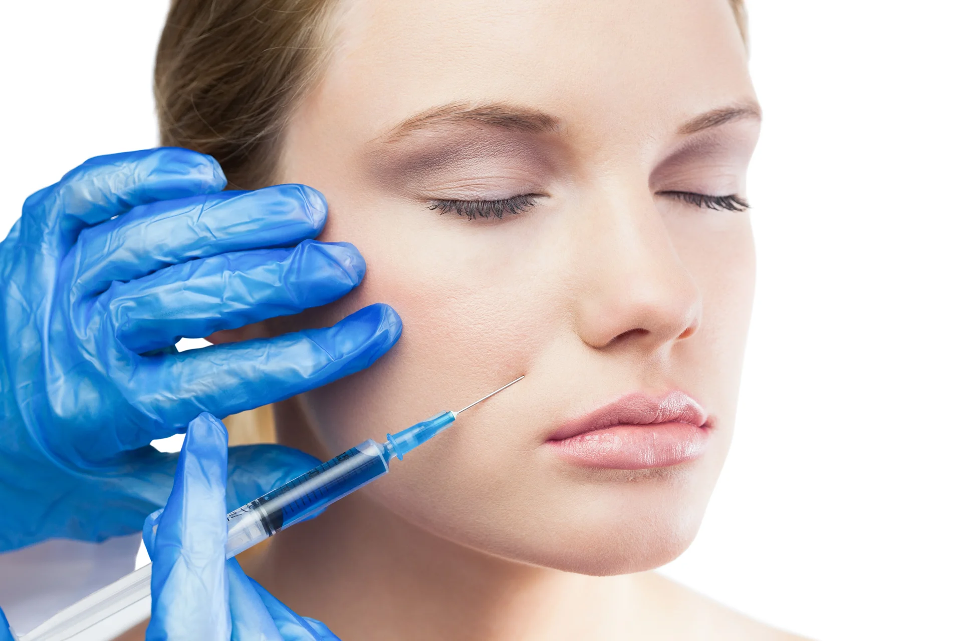 a woman getting cheek fillers||