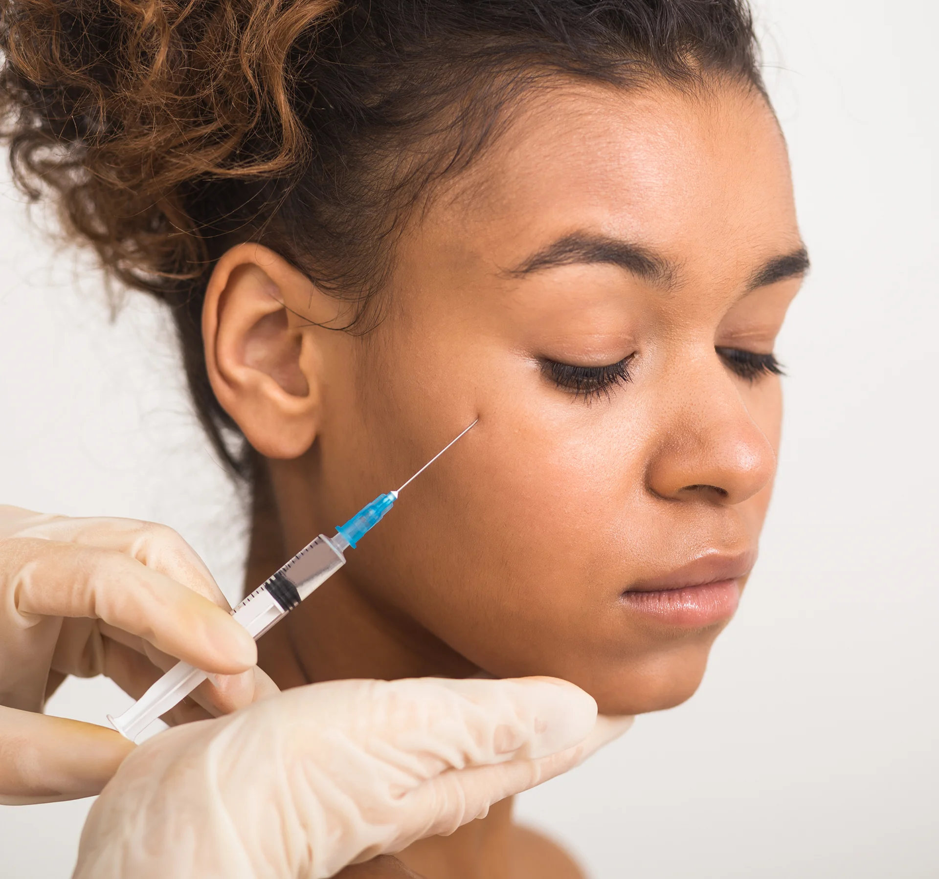 A Woman Getting Cheek Fillers||