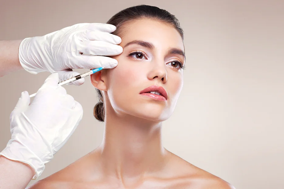 A Woman Getting Cheek Filler Treatment