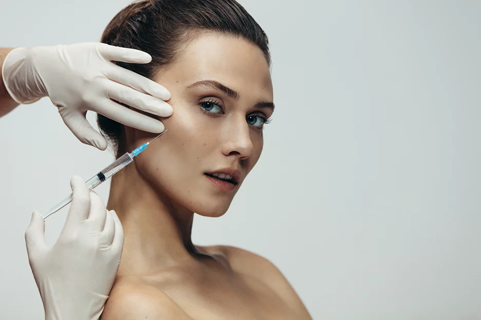 A Woman Getting Cheek Filler Treatment