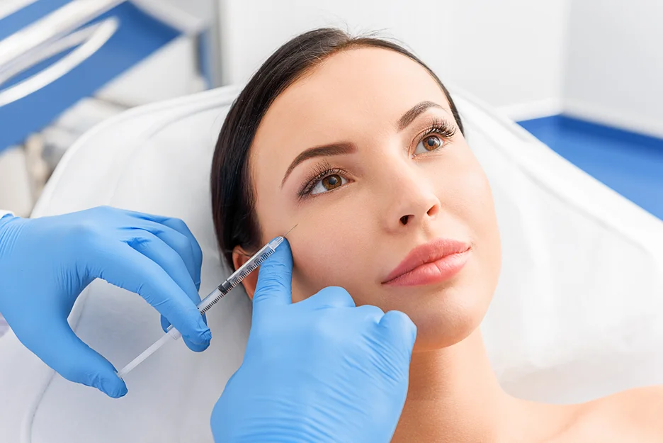 A Woman Getting Cheek Filler Treatment