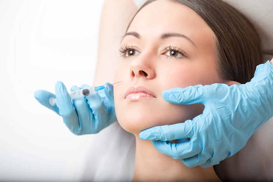 A Woman Getting Cheek Filler Treatment