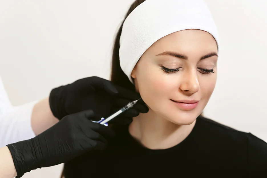 A woman getting cheek fillers