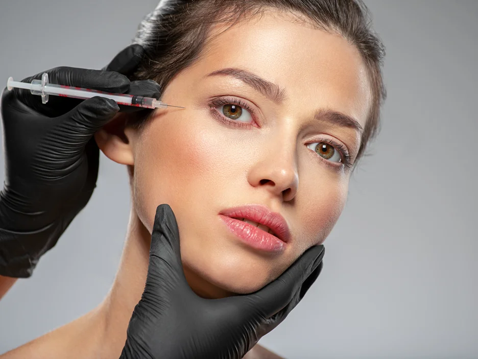 A woman getting cheek fillers