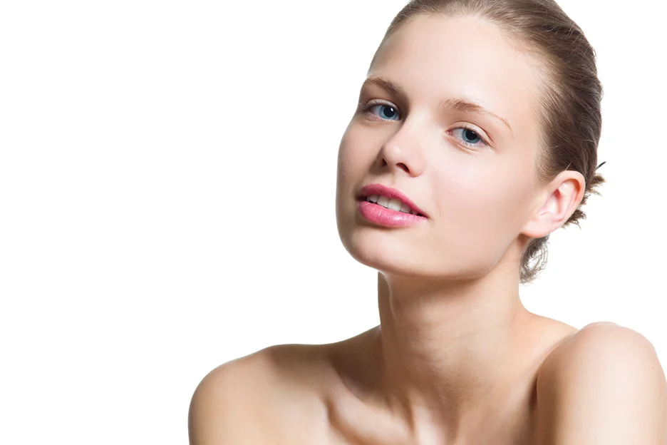 A Woman Flexing her Cheeks after Cheek Filler Treatment