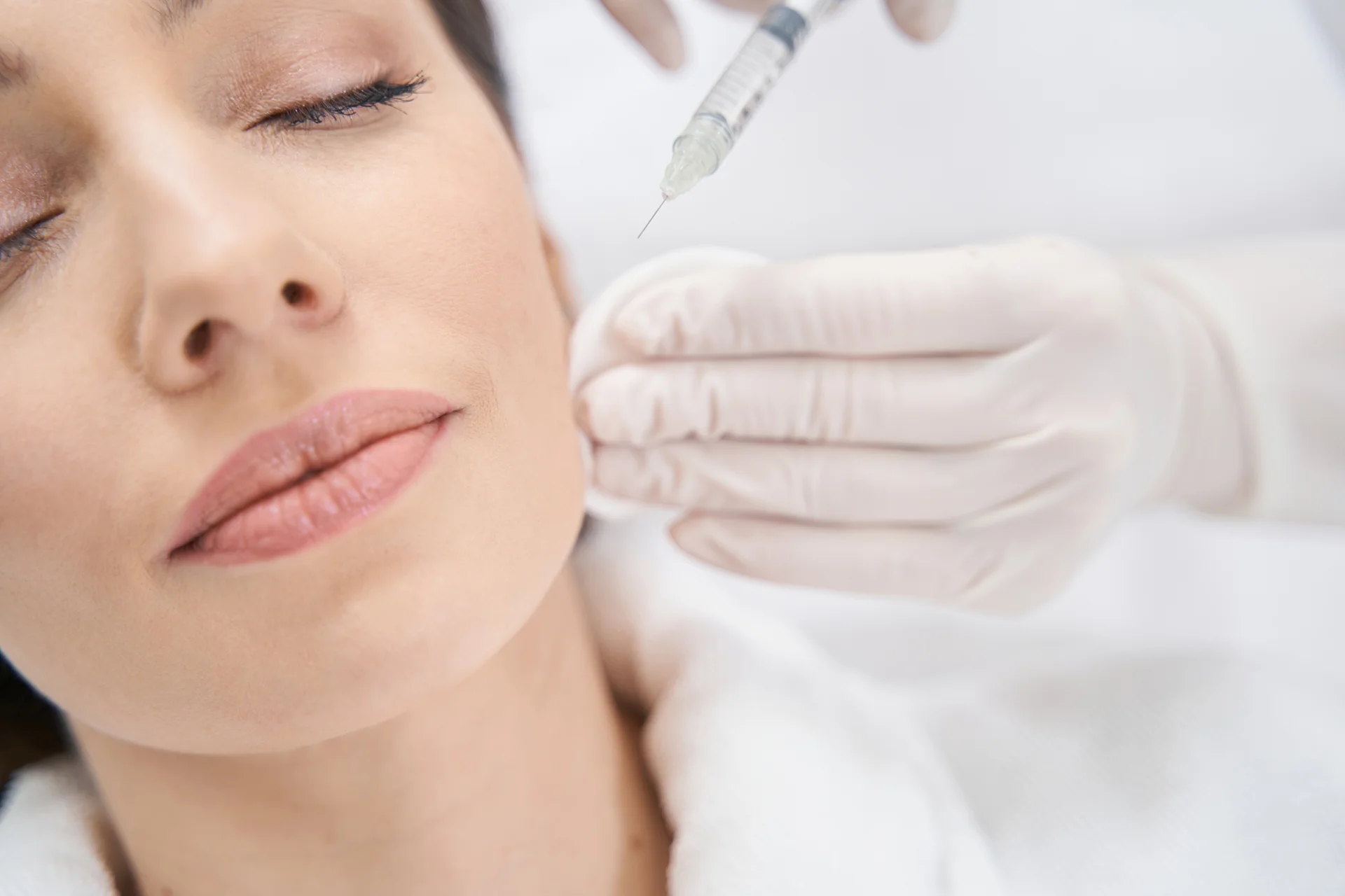 A Woman Getting Cheek Filler Treatment||