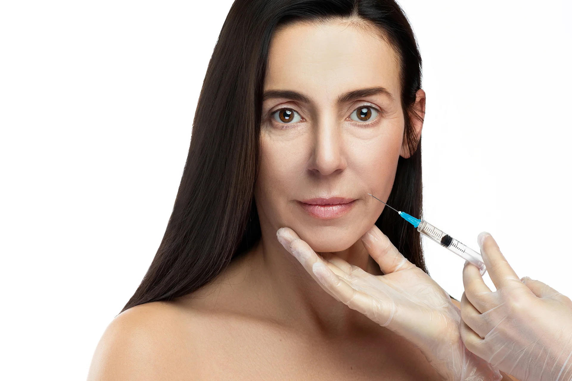 a woman getting cheek fillers|||||