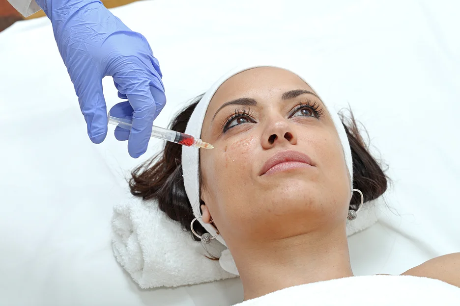 A woman getting cheek fillers