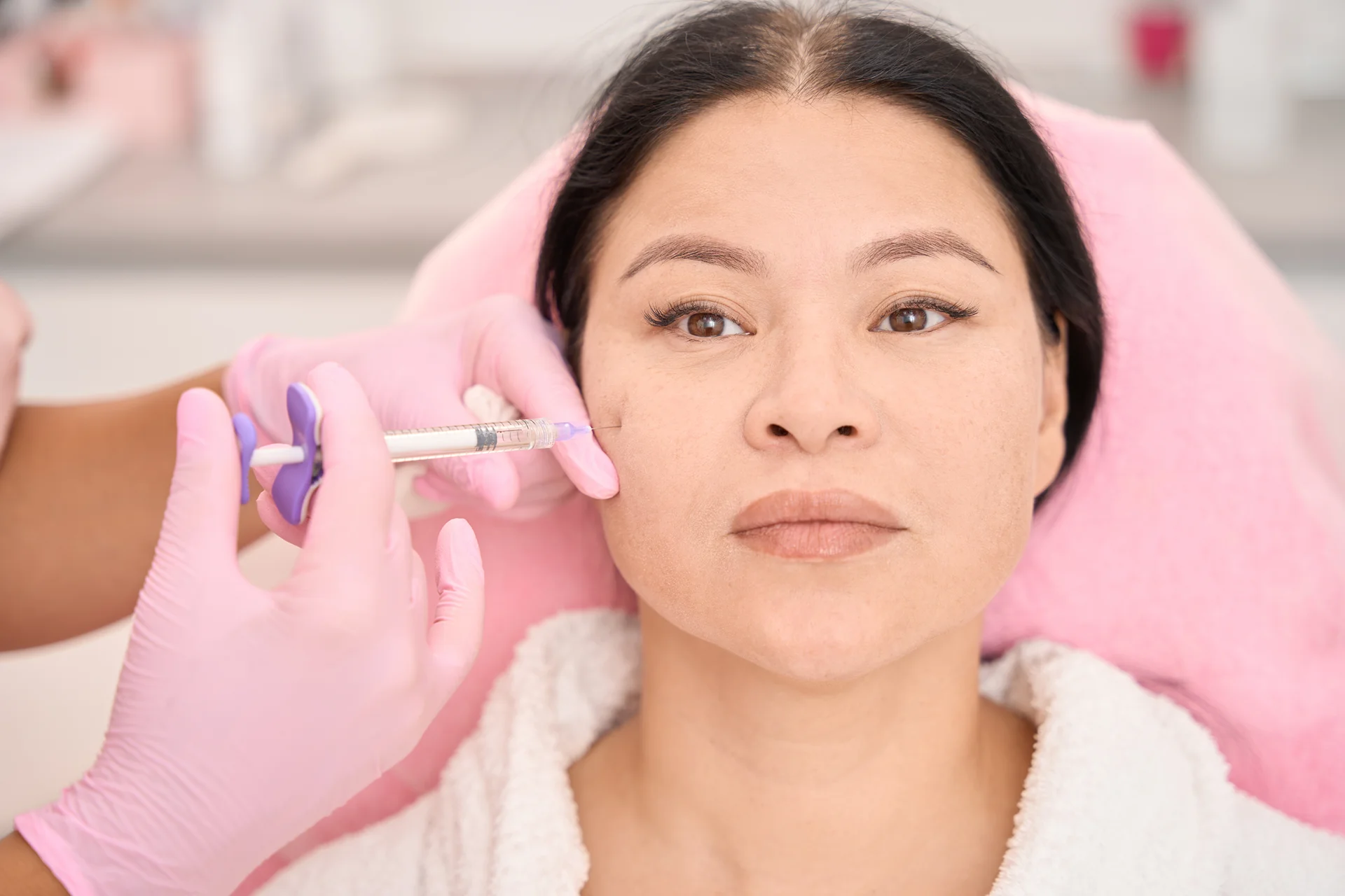 a woman having cheek fillers||