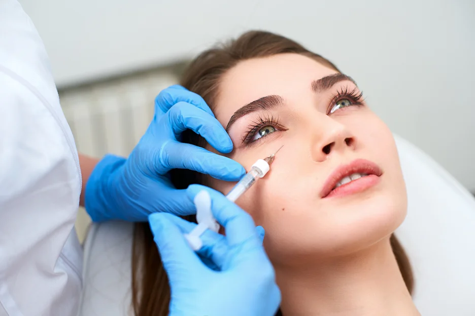 a woman underwent cheek filler treatment