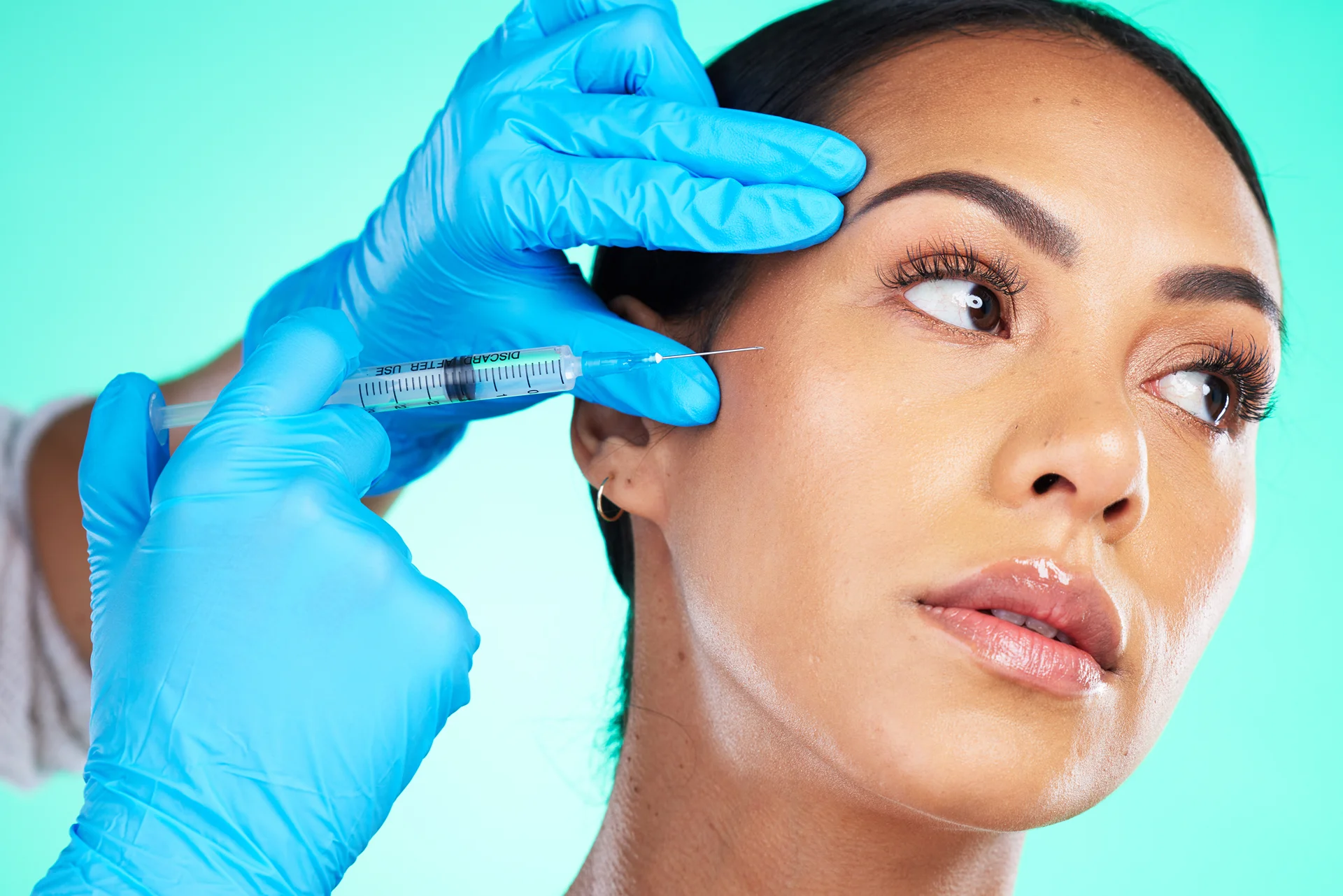A Woman Getting Cheek Filler||