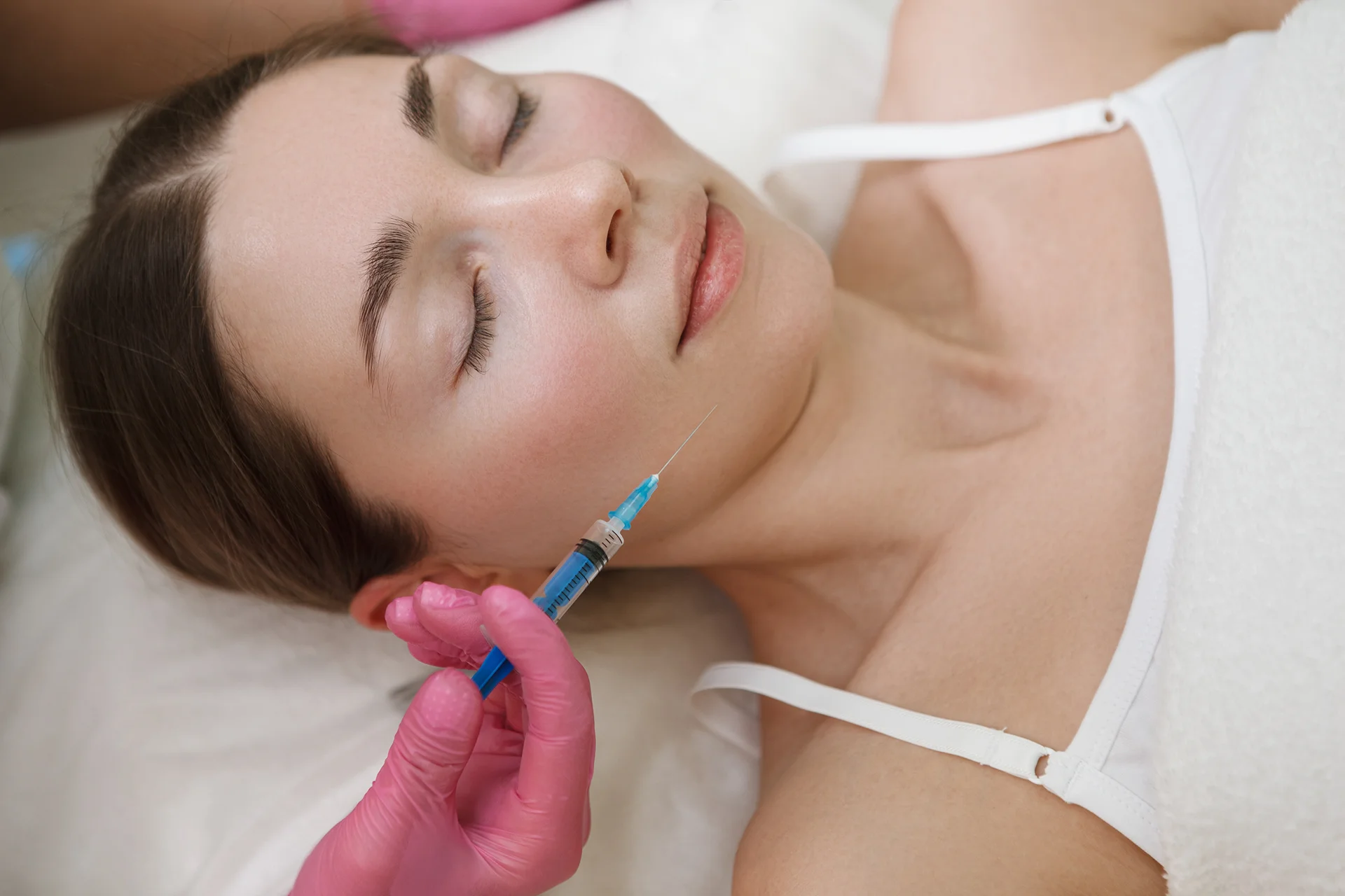 A woman having cheek filler||