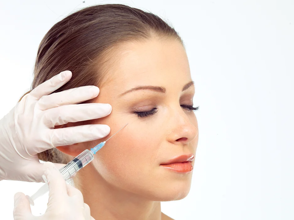 A Woman Getting Cheek Filler Treatment