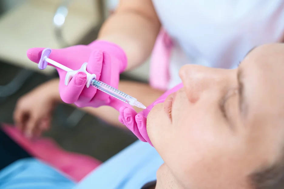 a man had dermal fillers injection on his chin