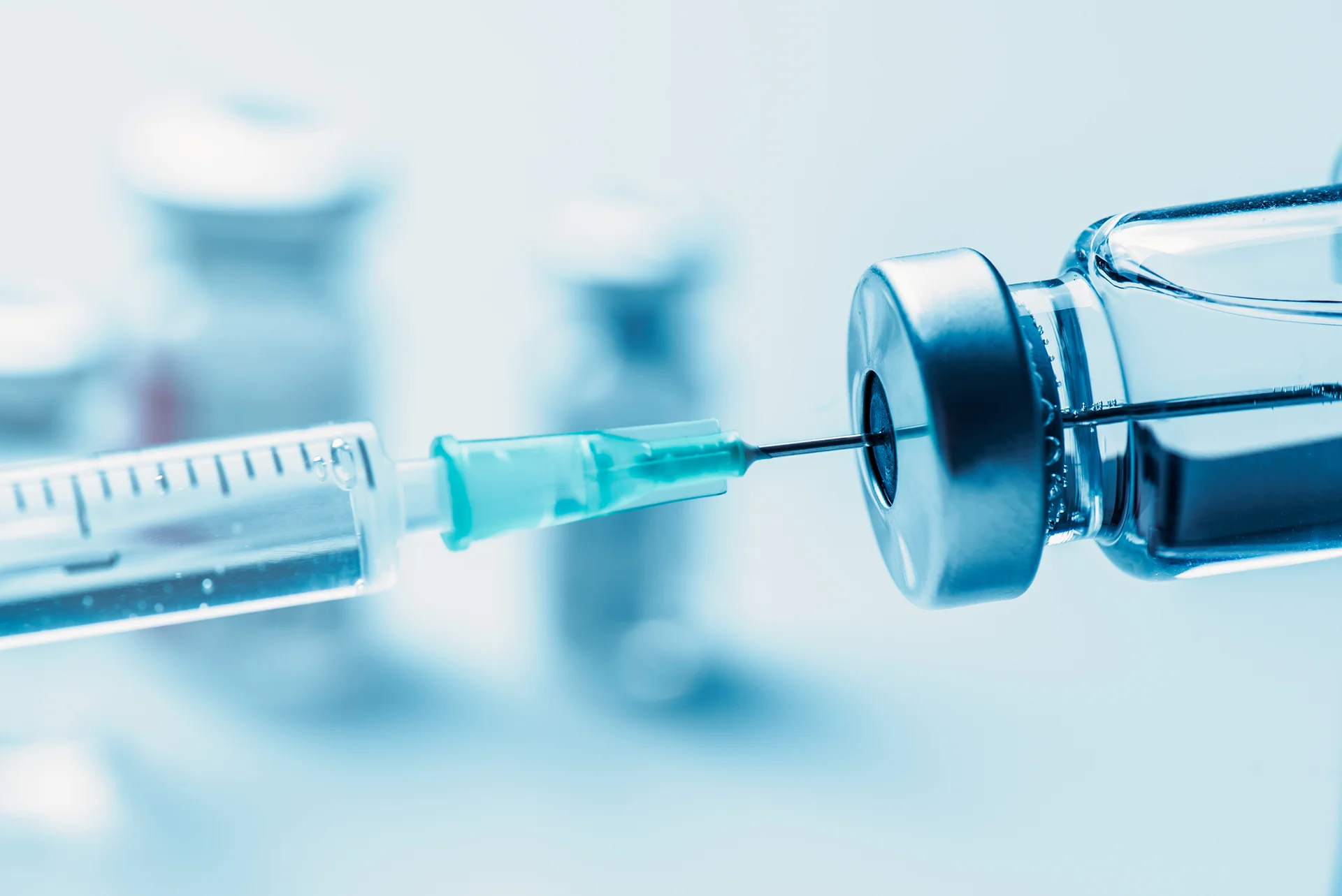 a syringe and a vial||