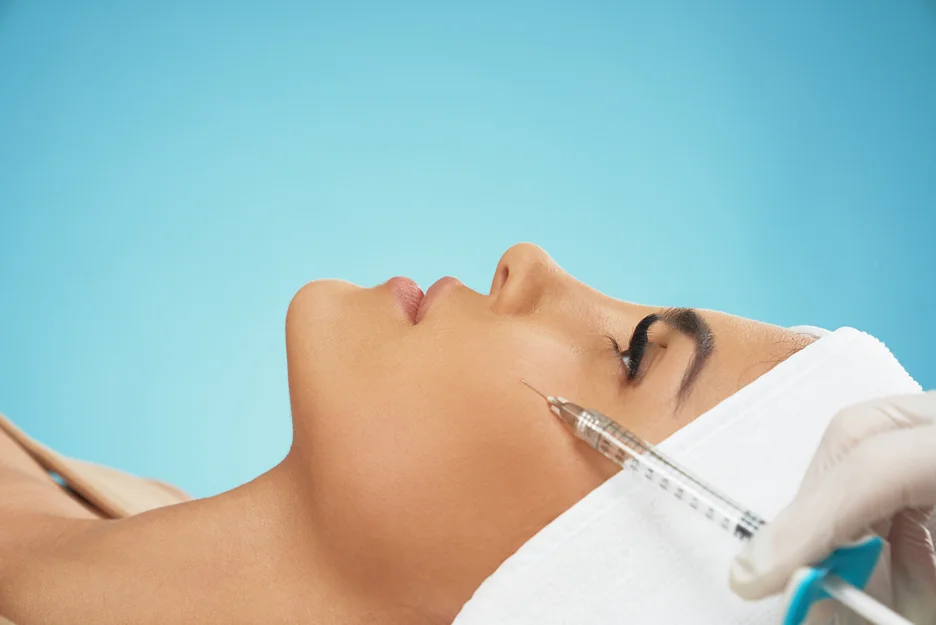 A Woman Getting Cheek Filler Treatment