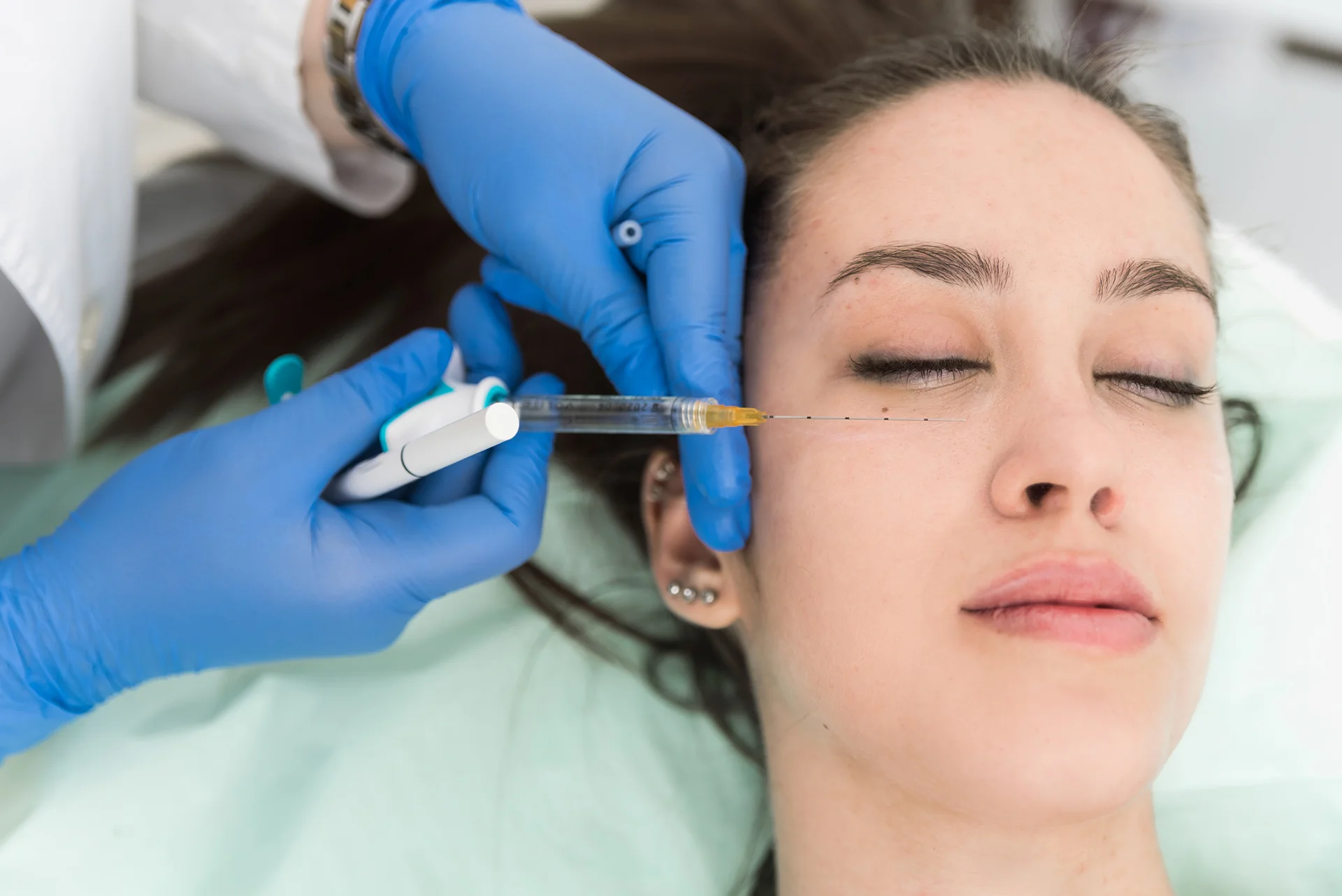 A Woman Getting Cheek Filler Under Eyes||