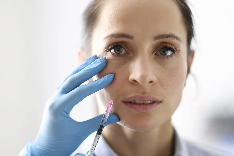 A woman getting cheek fillers