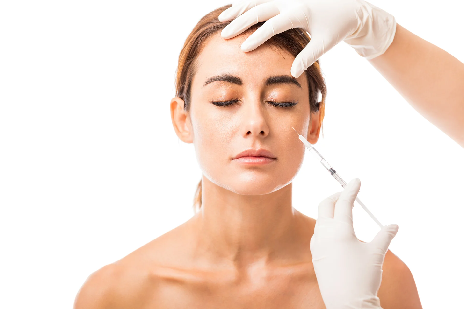 a woman getting cheek filler treatment|||