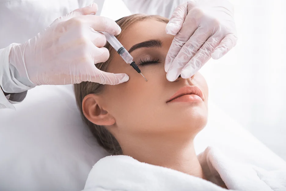 A Woman Getting Cheek Filler Treatment