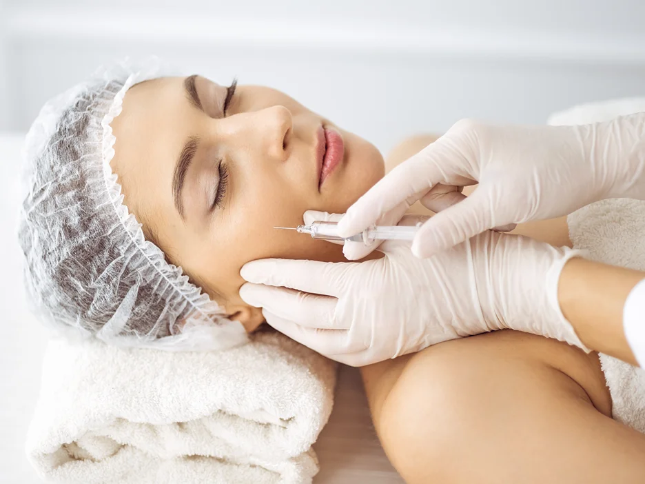 A Woman Getting Cheek Filler Treatment