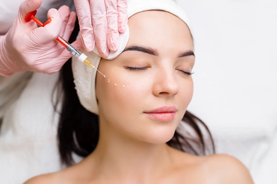 A woman getting cheek fillers