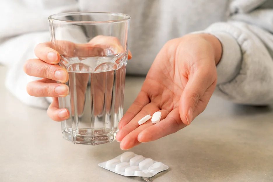 medicine and a glass of water