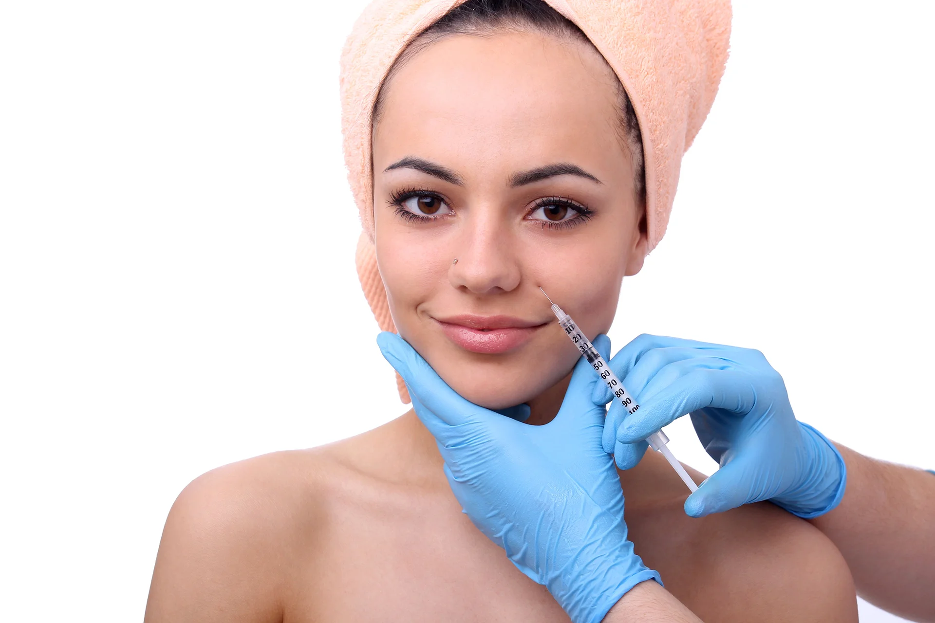 a woman getting cheek fillers|||