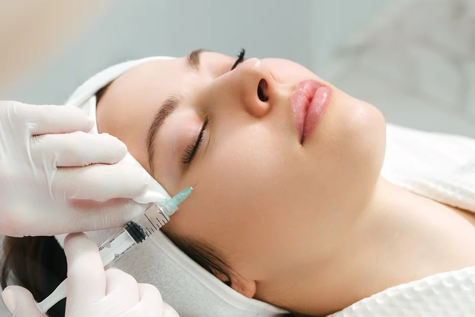 A Woman Getting Cheek Filler treatment
