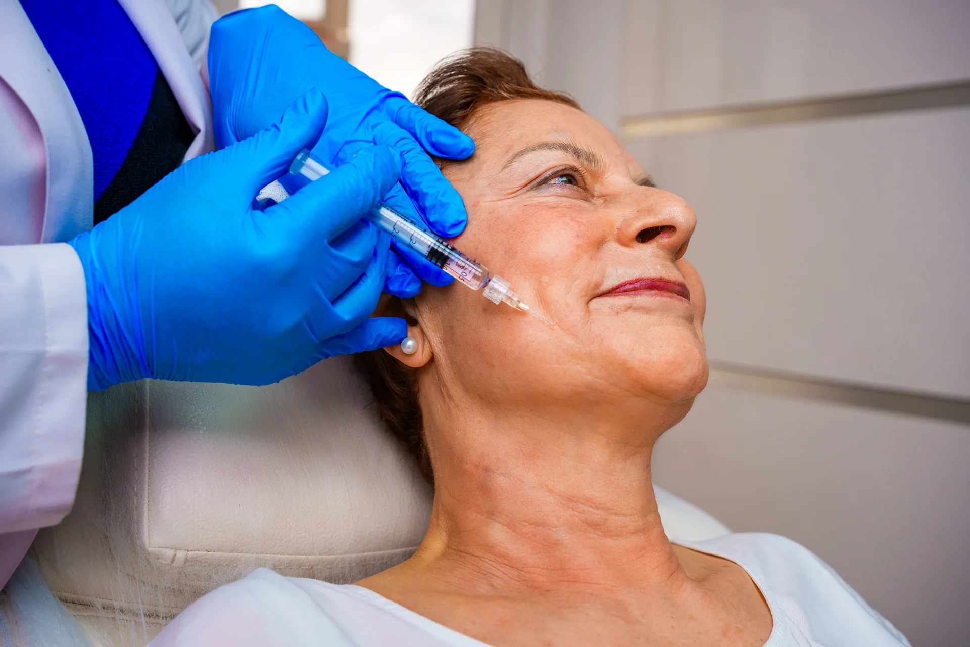 A Woman Getting Cheek Filler||