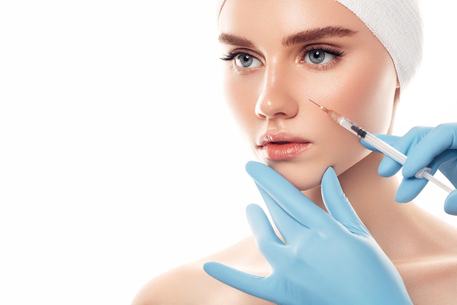 a woman getting cheek fillers|||