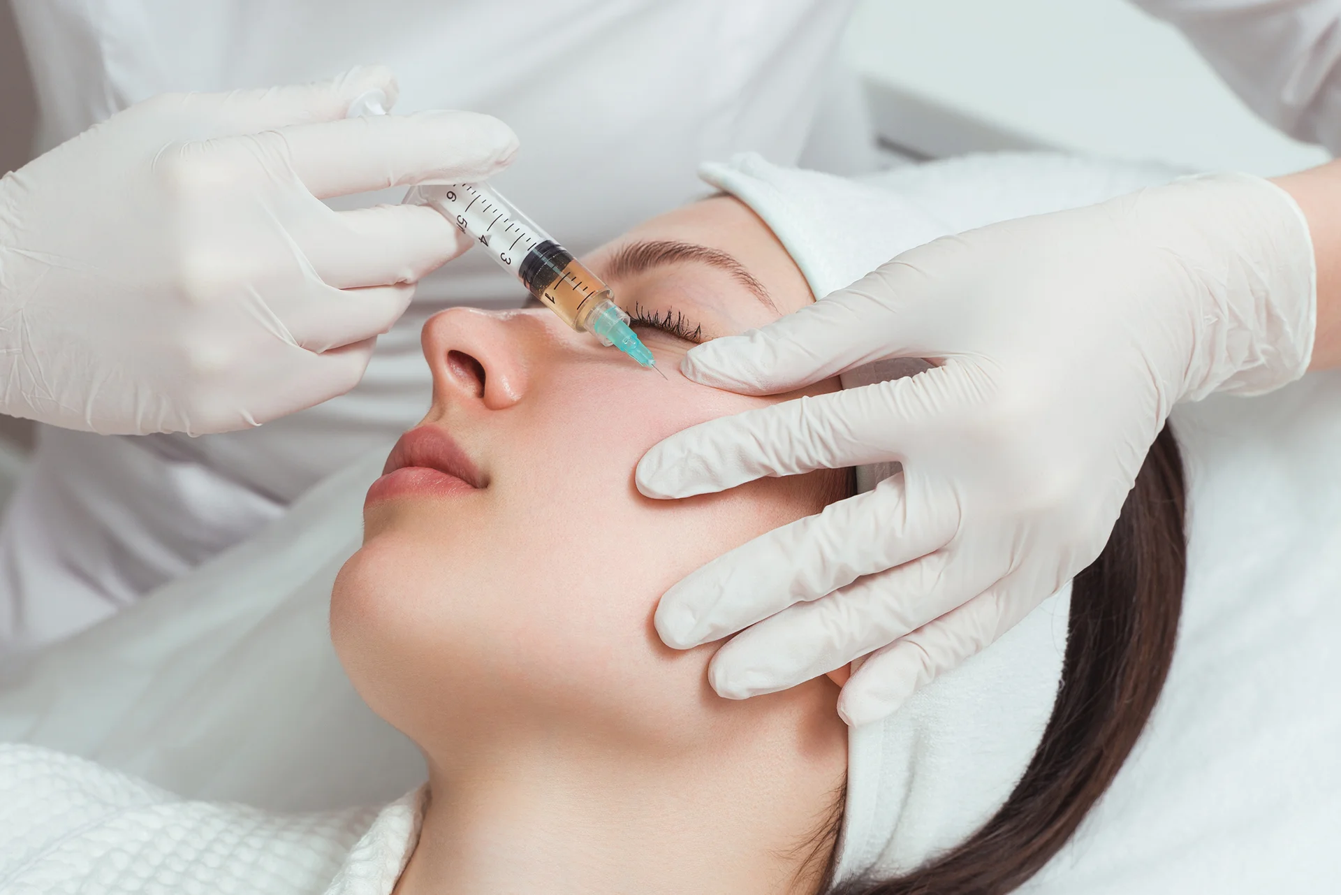 A woman getting Cheek Filler Injection|||