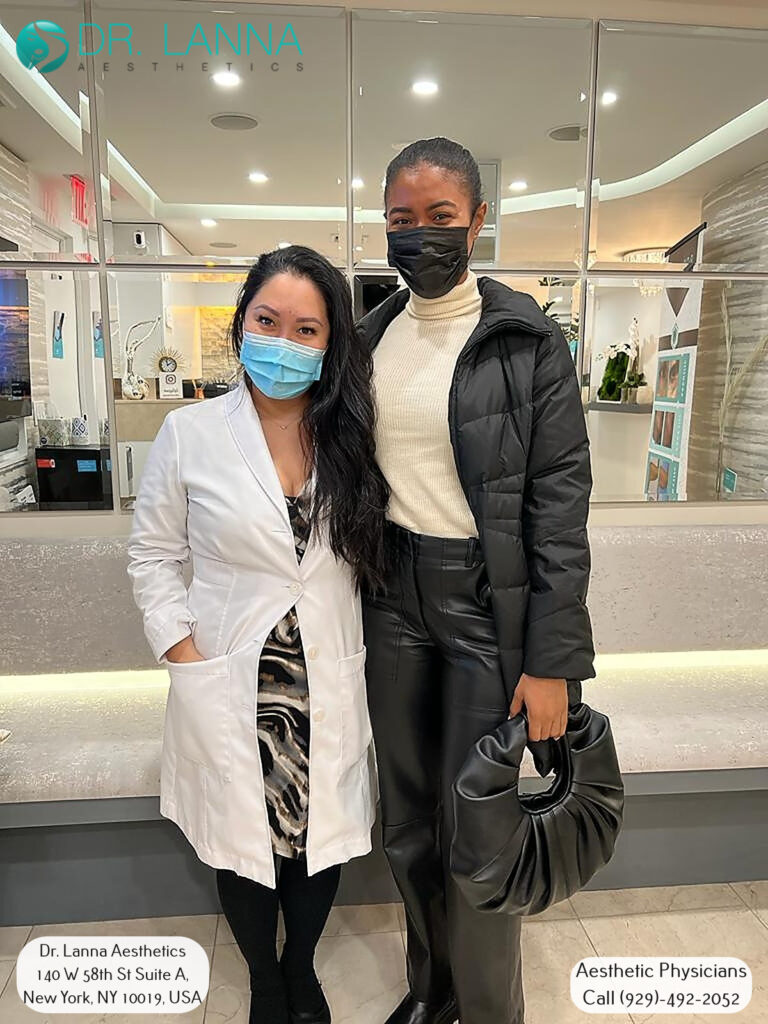 Dr. Lanna Cheuck with a cheek filler client at the clinic reception in NYC