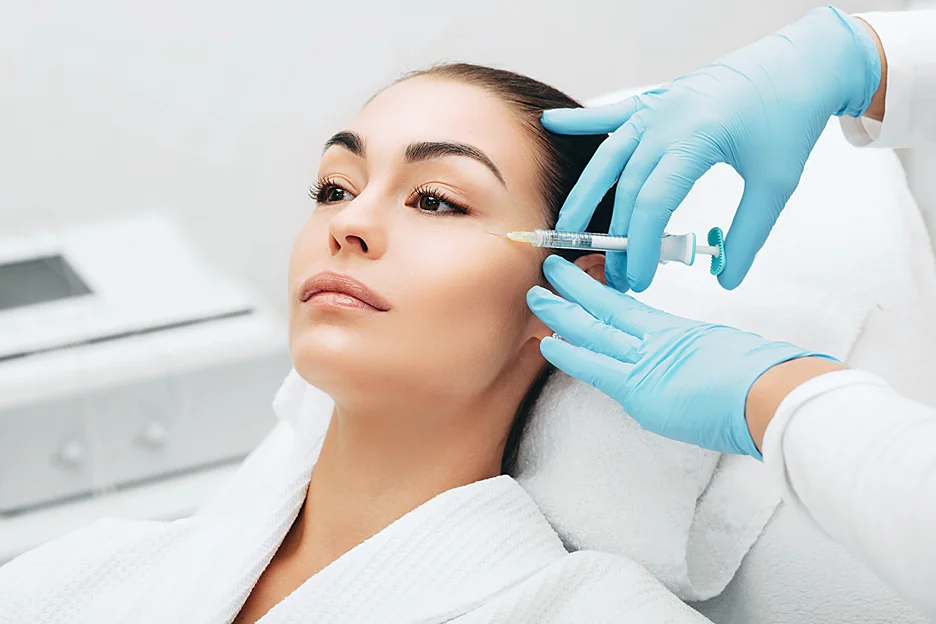 A Woman Getting Cheek Filler Treatment