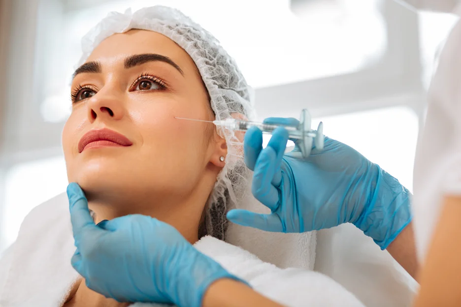 A Woman Getting Cheek Filler Treatment
