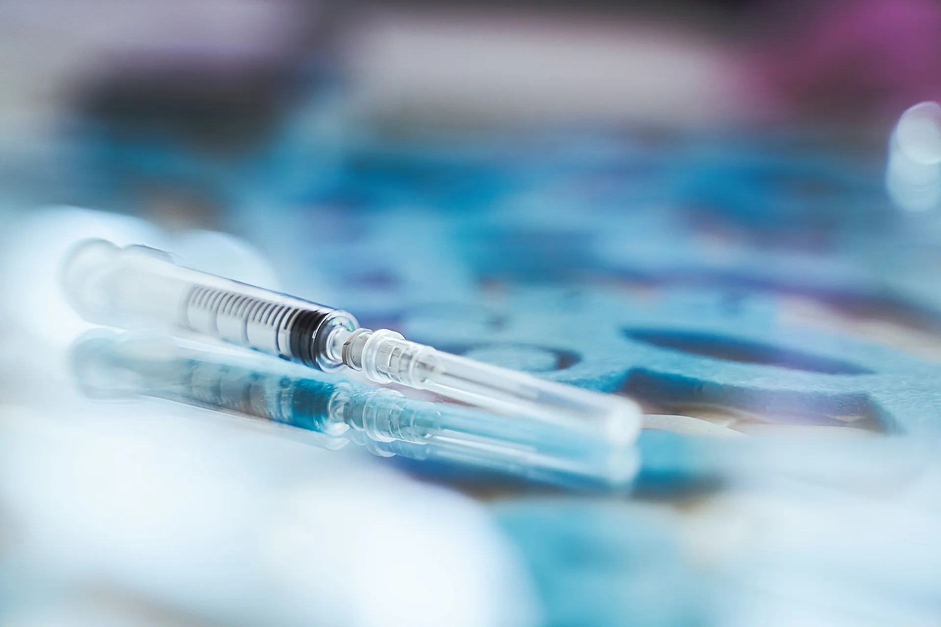 a syringe filled with dermal filler injection||woman get dermal fillers on Dr. Lanna will see them when she was watched.
