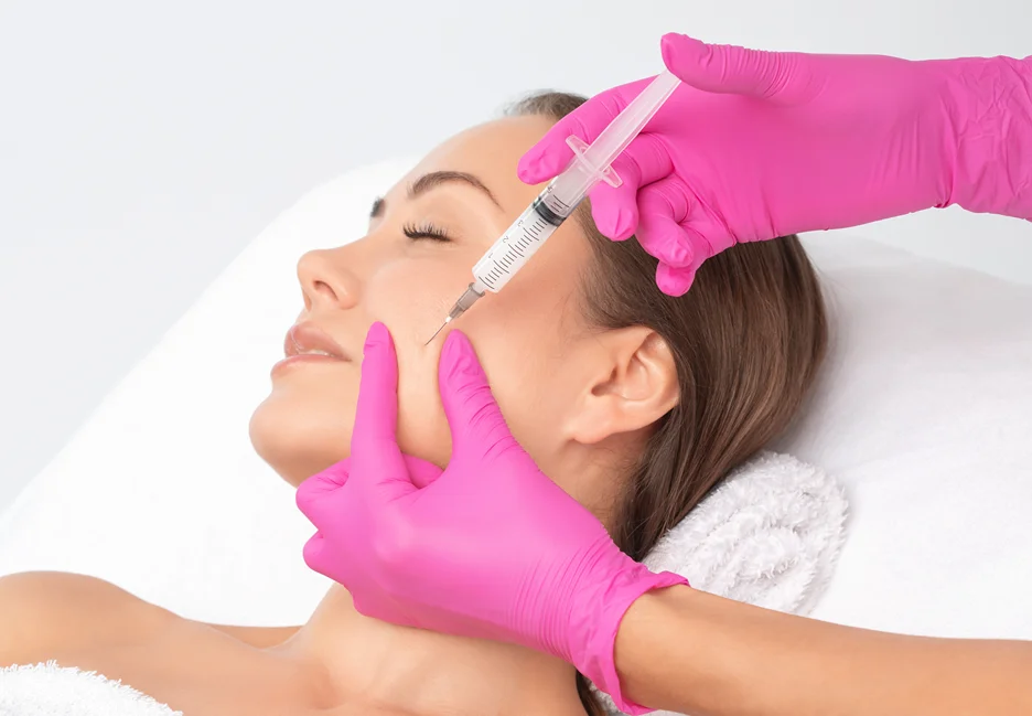 a woman getting cheek fillers
