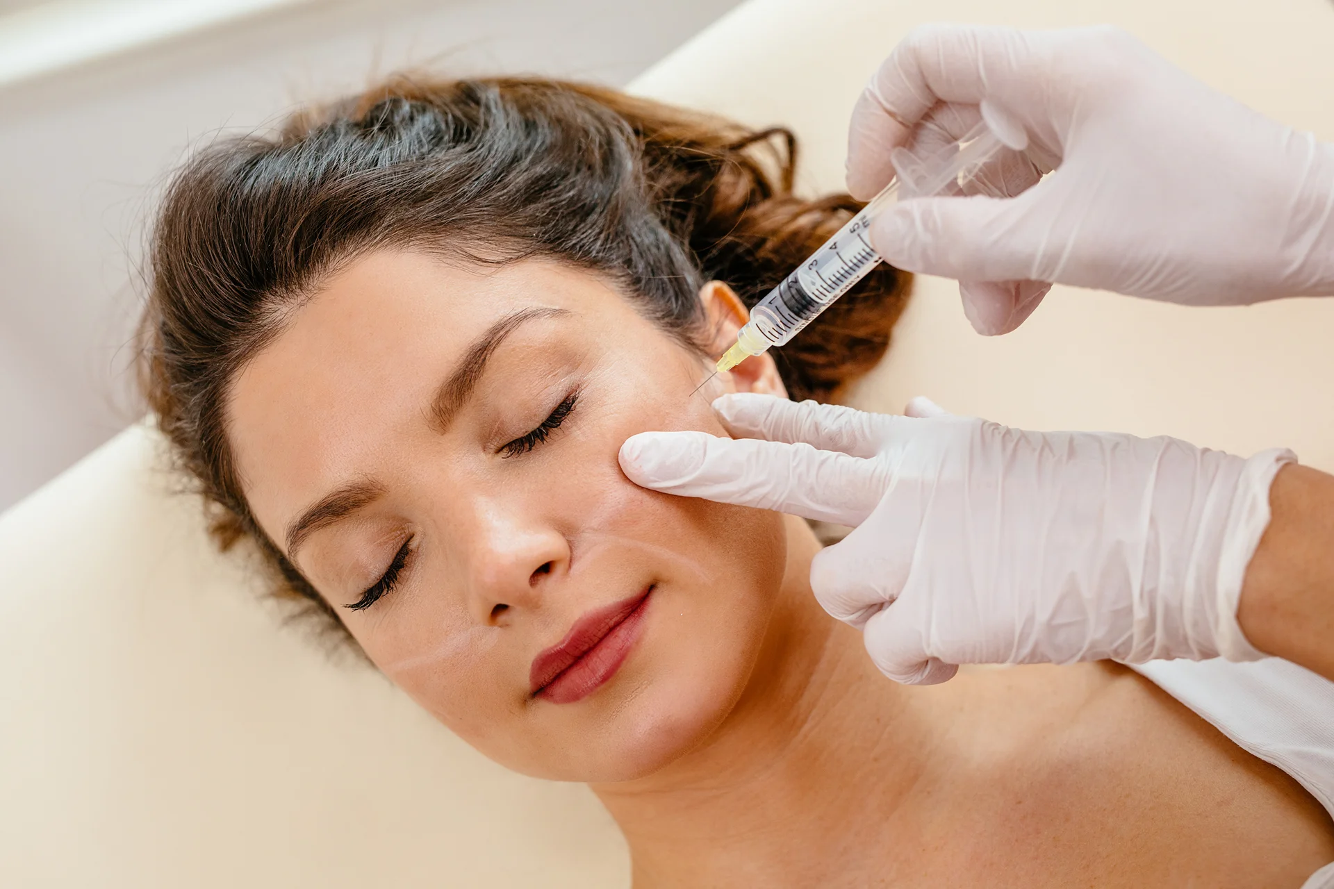 a woman having cheek fillers||