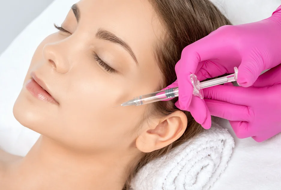A woman getting lateral cheeks filler
