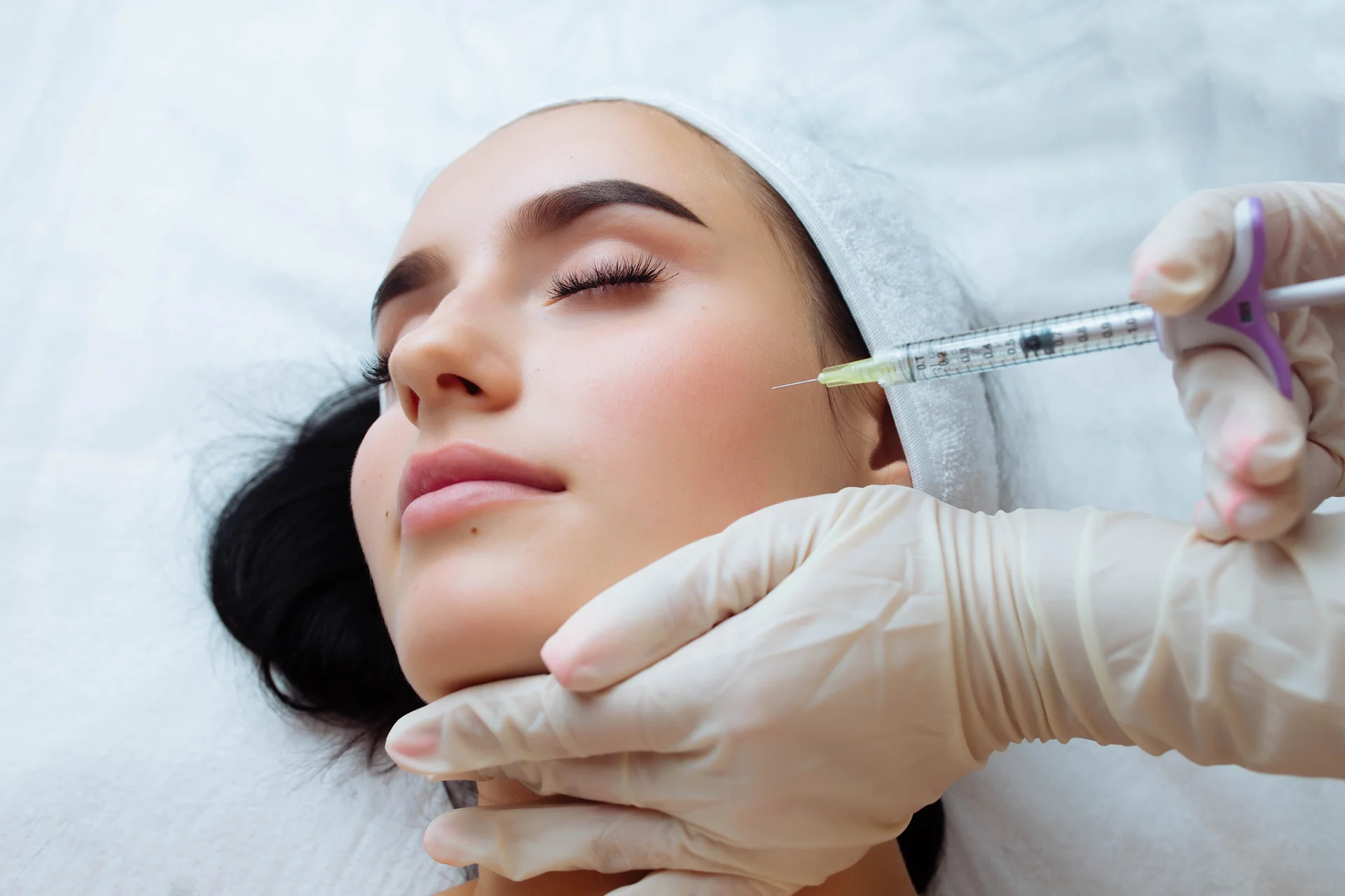 a woman having cheek fillers||