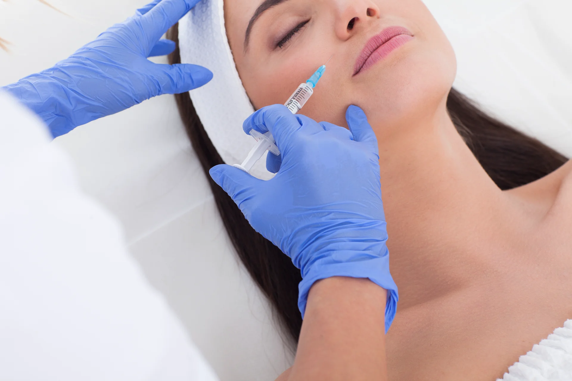 Woman having cheek fillers||