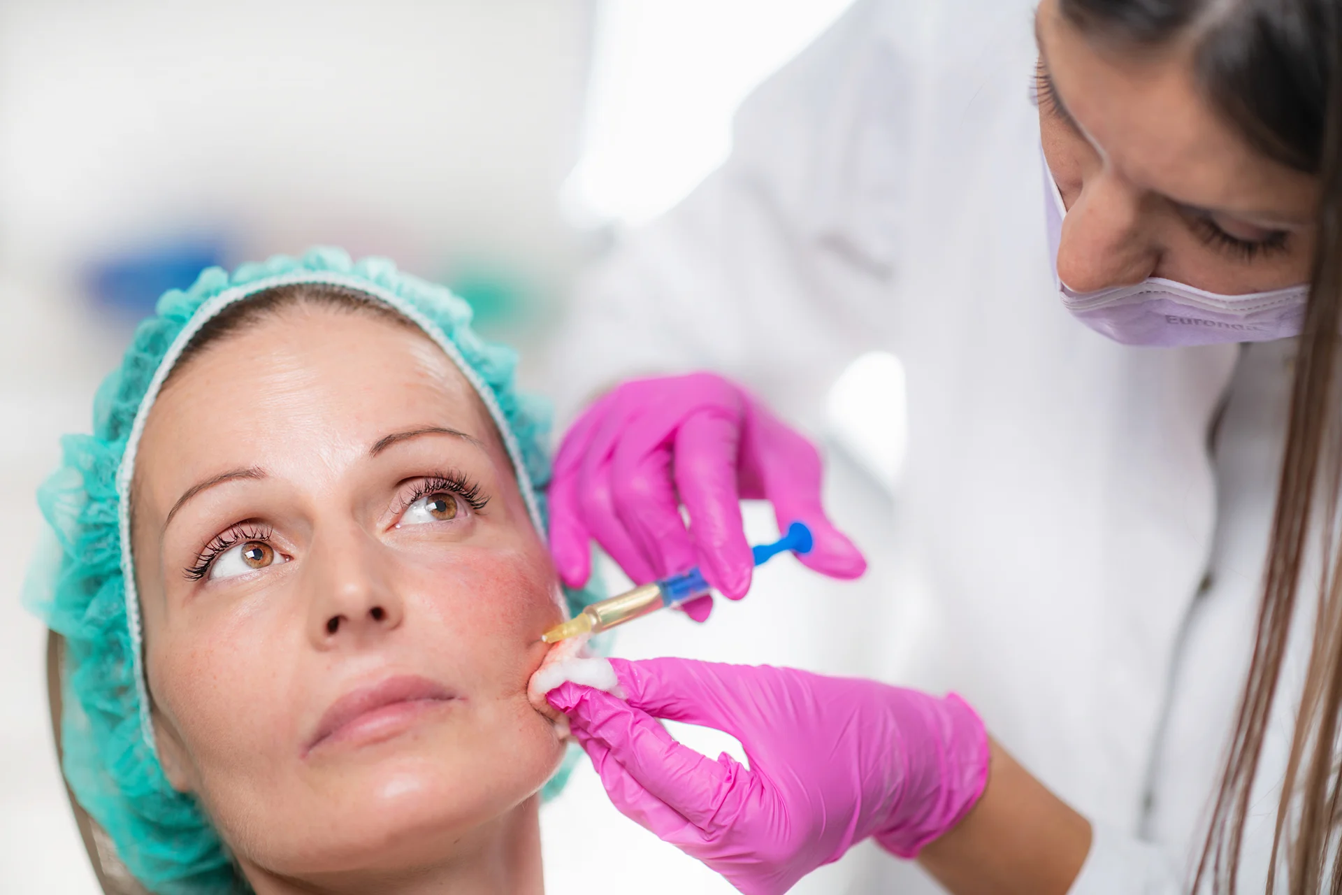 A woman having cheek fillers||
