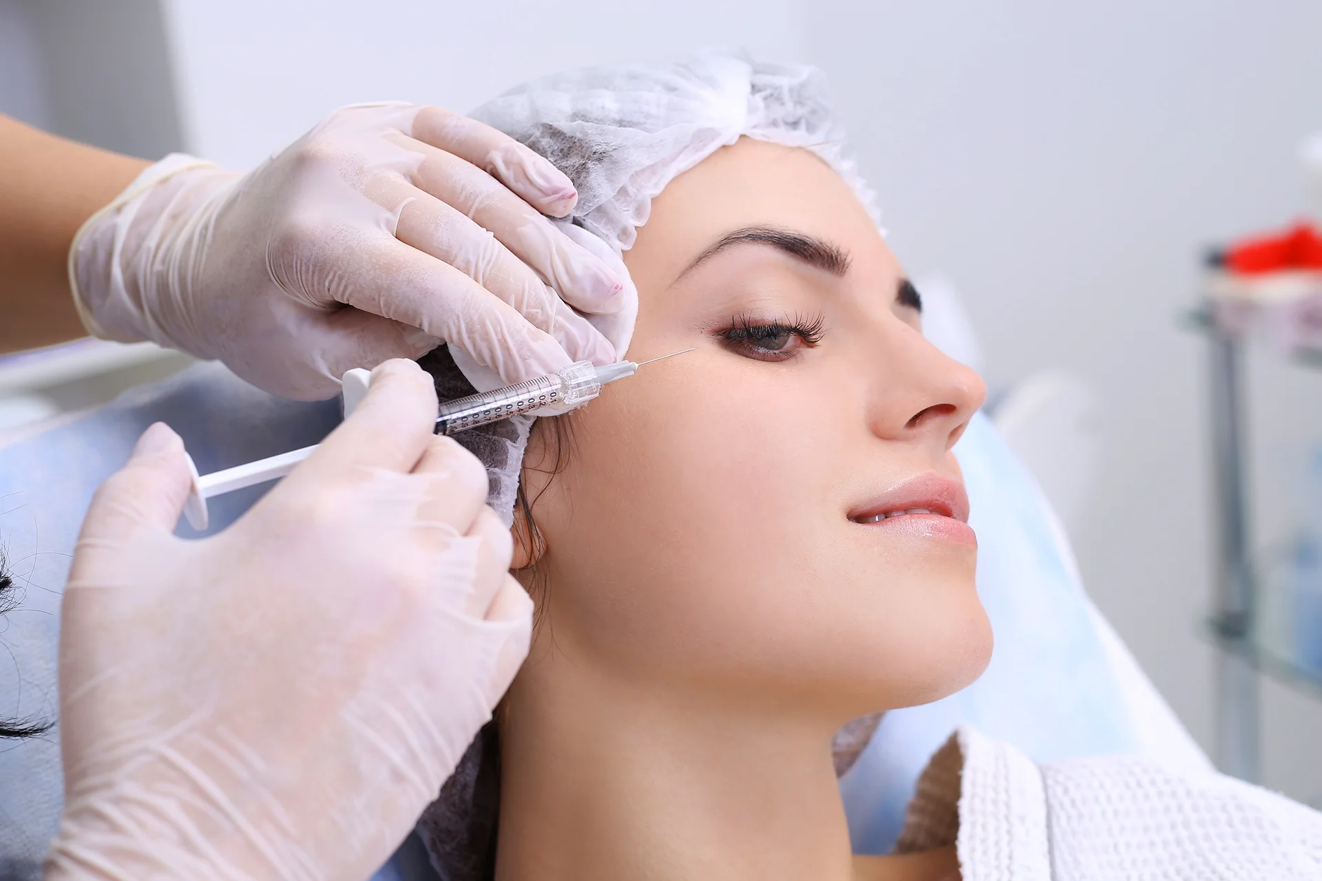 A woman getting cheek fillers||