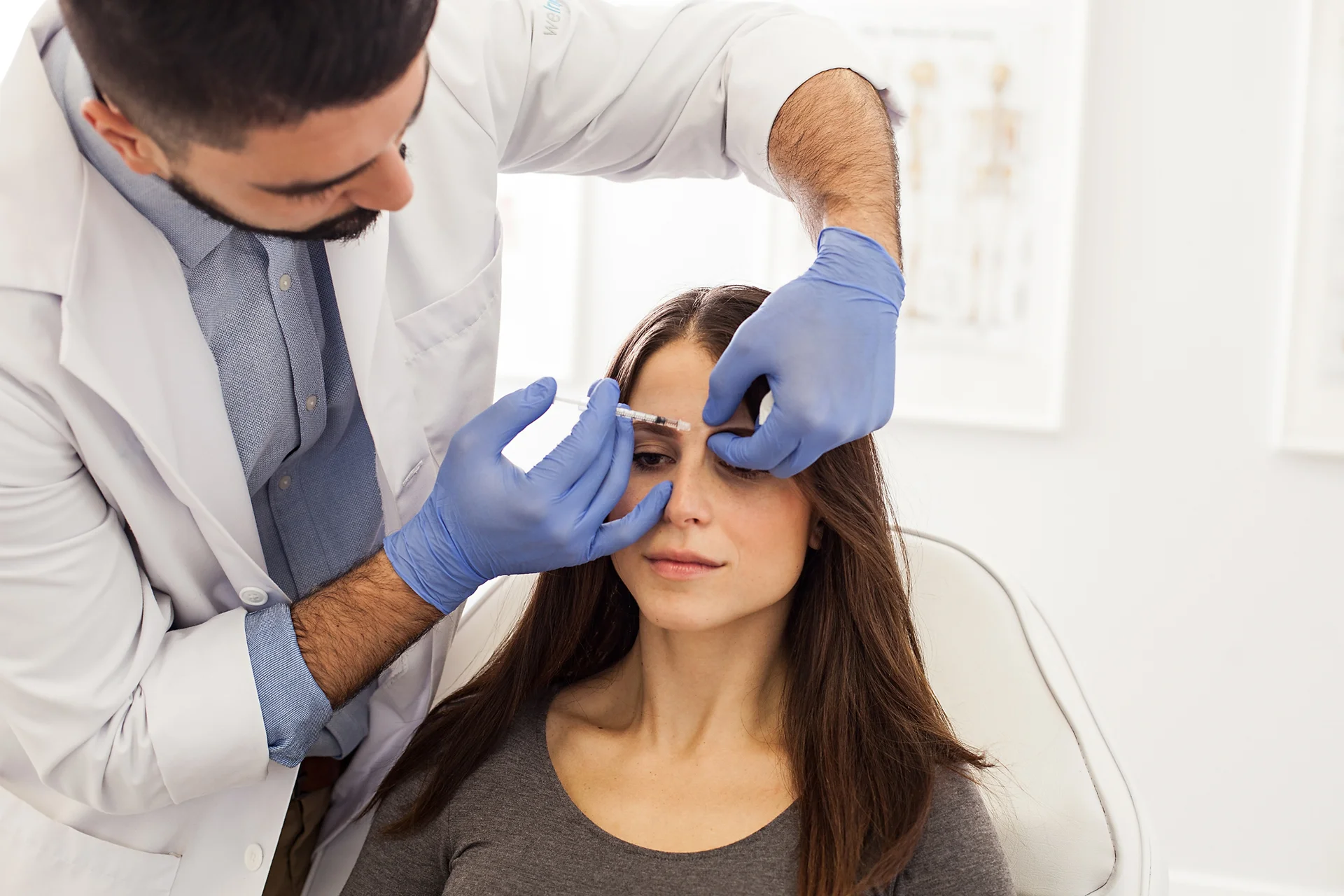 preparing for dermal fillers things to know and expect|a woman had consultation with her dermal filler injector|a woman receives lip filler procedure
