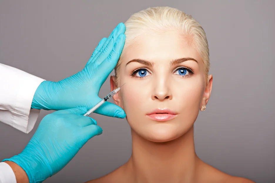 A Woman Getting Cheek Filler Treatment